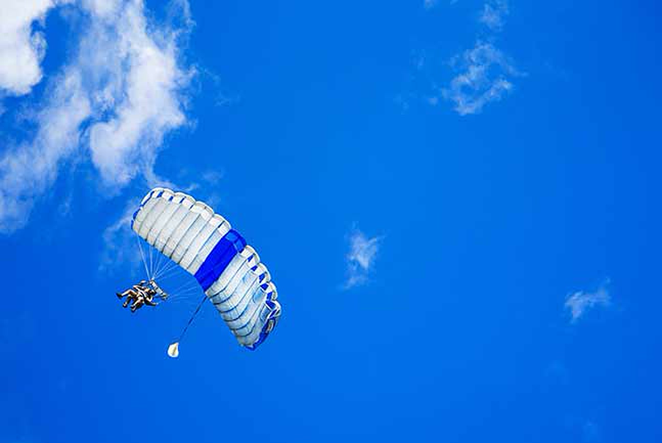 Skydiver with parachute open