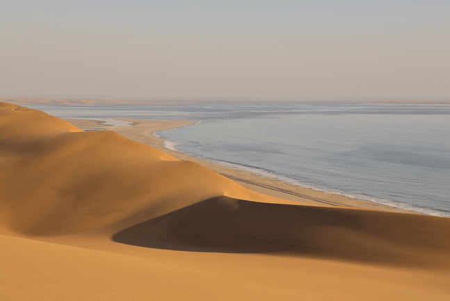 Dunes meet the ocean at Sandwich Harbour