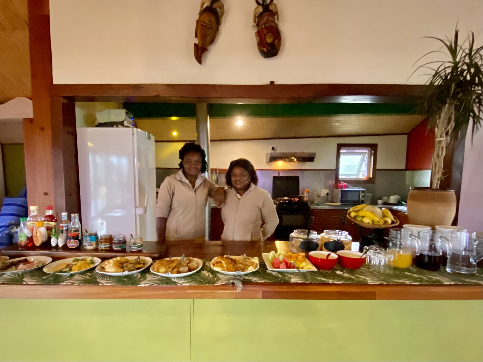 The Stiltz breakfast team with a generous buffet spread
